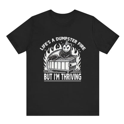 Black t-shirt with graphic design and text on a white background