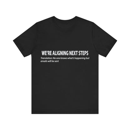 Black t-shirt with white text on a white background