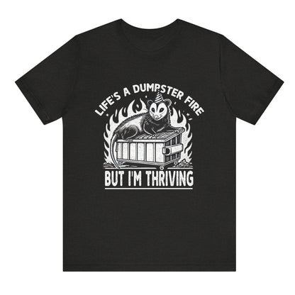 Black t-shirt with graphic design and text on a white background