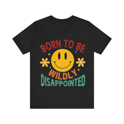Black t-shirt with a smiley face and colorful text on a white background