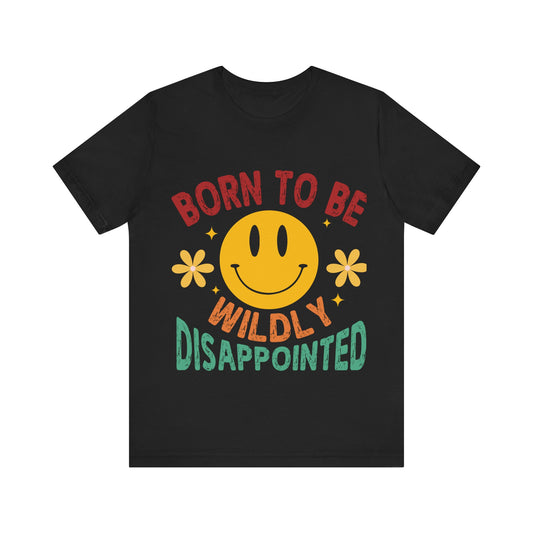 Black t-shirt with a smiley face and colorful text on a white background