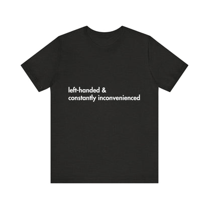 Black t-shirt with white text 'left-handed & constantly inconvenienced' on a white background