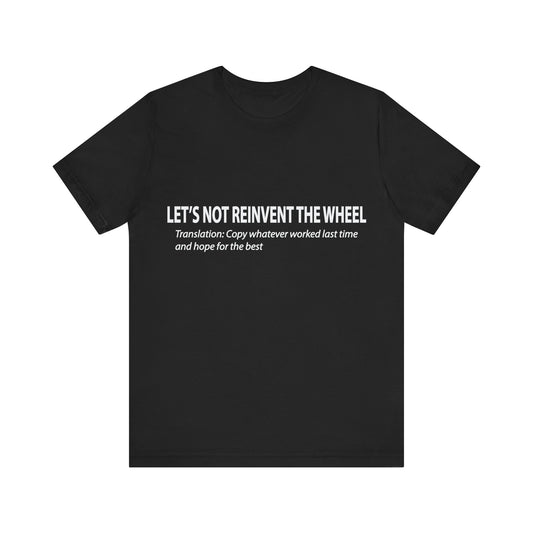 Black t-shirt with white text on a white background