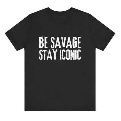 Black t-shirt with 'BE SAVAGE STAY ICONIC' text on a white background