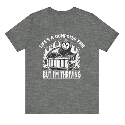 Gray t-shirt with a graphic design and text on a white background
