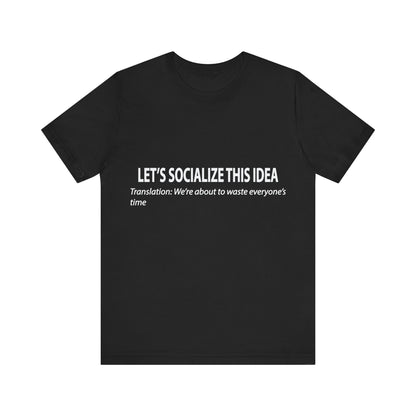 Black t-shirt with white text on a white background