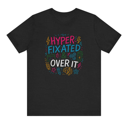 Black t-shirt with colorful text design on a white background