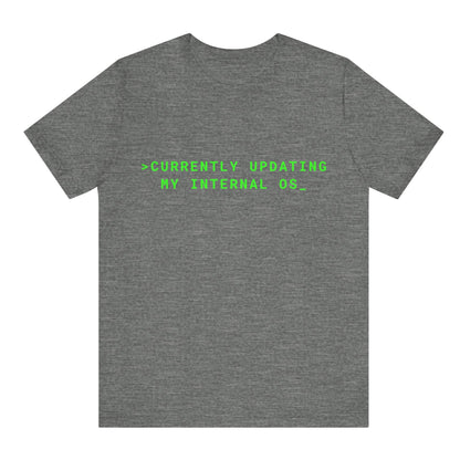 Gray t-shirt with green text on a white background
