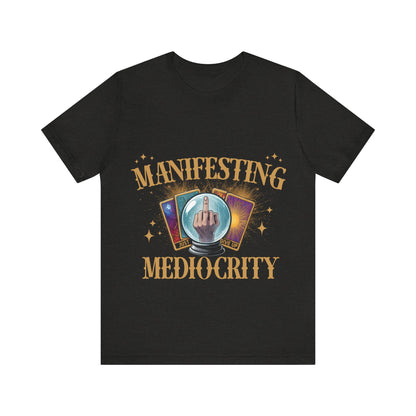 Black t-shirt with 'Manifesting Mediocrity' graphic design on a white background