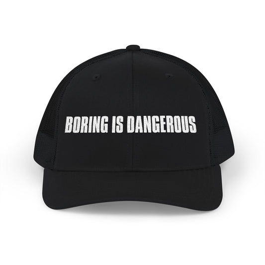 Black cap with 'Boring is Dangerous' text on a white background