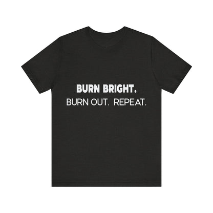 Black t-shirt with white text 'BURN BRIGHT. BURN OUT. REPEAT.' on a white background