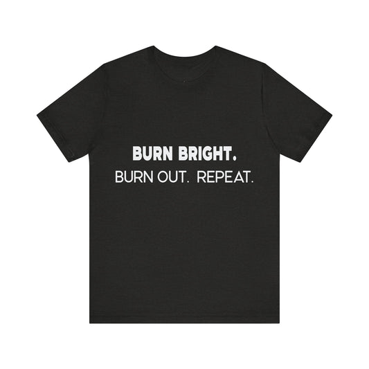 Black t-shirt with white text 'BURN BRIGHT. BURN OUT. REPEAT.' on a white background