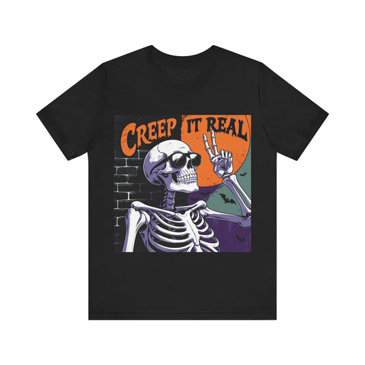 Black t-shirt with a skeleton graphic and 'Creep It Real' text on a white background