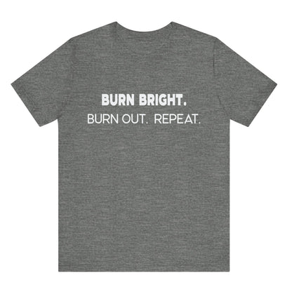 Gray t-shirt with white text 'BURN BRIGHT. BURN OUT. REPEAT.' on a white background