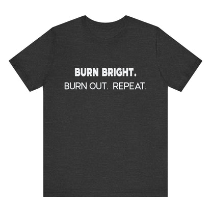 Black t-shirt with white text 'BURN BRIGHT. BURN OUT. REPEAT.' on a white background