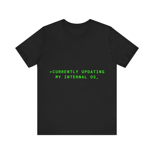 Black t-shirt with green text 'CURRENTLY UPDATING MY INTERNAL OS_' on a white background