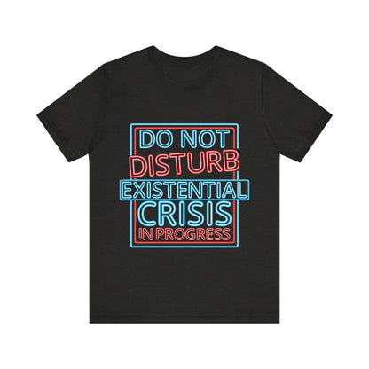 Black t-shirt with colorful text 'DO NOT DISTURB EXISTENTIAL CRISIS IN PROGRESS' on a white background