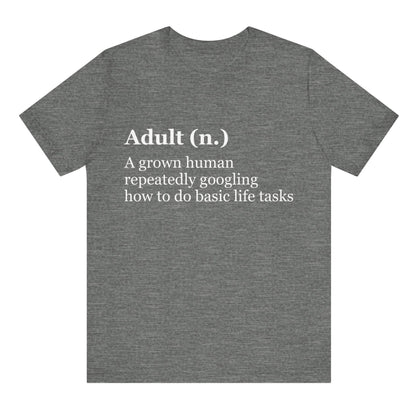 Gray t-shirt with humorous definition of 'adult' printed on the back.