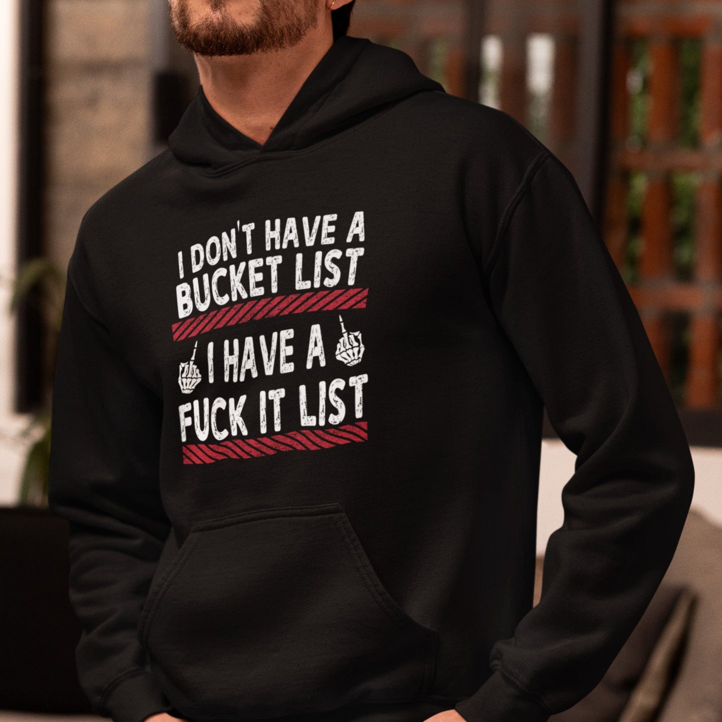 Person wearing a black hoodie with humorous text design.
