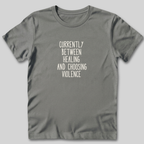 Between Healing and Violence T-Shirt