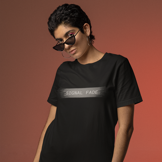 Woman wearing a black t-shirt with text on a gradient background